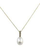 Load image into Gallery viewer, 10 Kt Yellow Gold Oval Fresh Water Pearl and Diamond Pendent.
